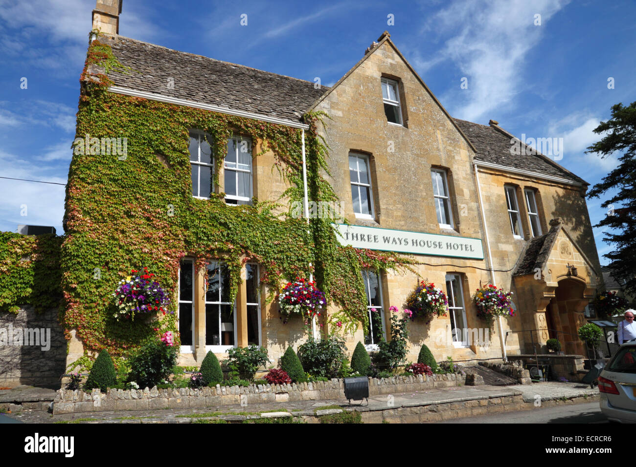 A country house hotel with ivy-covered walls and a Three Ways House sign. Stock Photo
