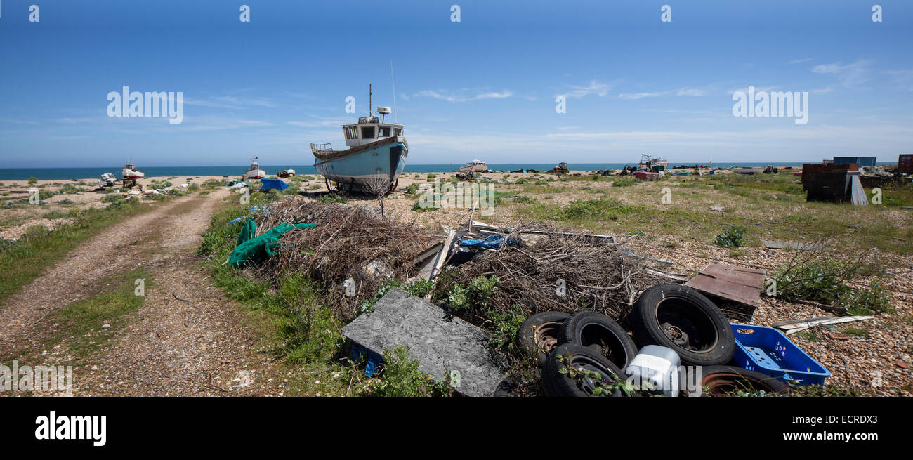 Dungerness Beach with fishing boat and detritus. Stock Photo