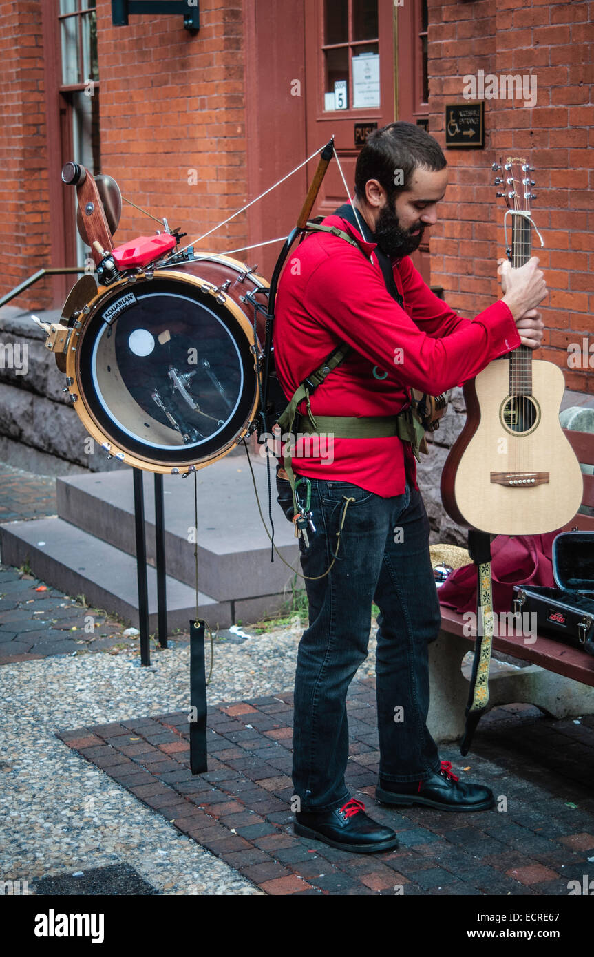 One man band, busker, street musician, outside Lancaster, PA farmers market  playing for tips Stock Photo - Alamy