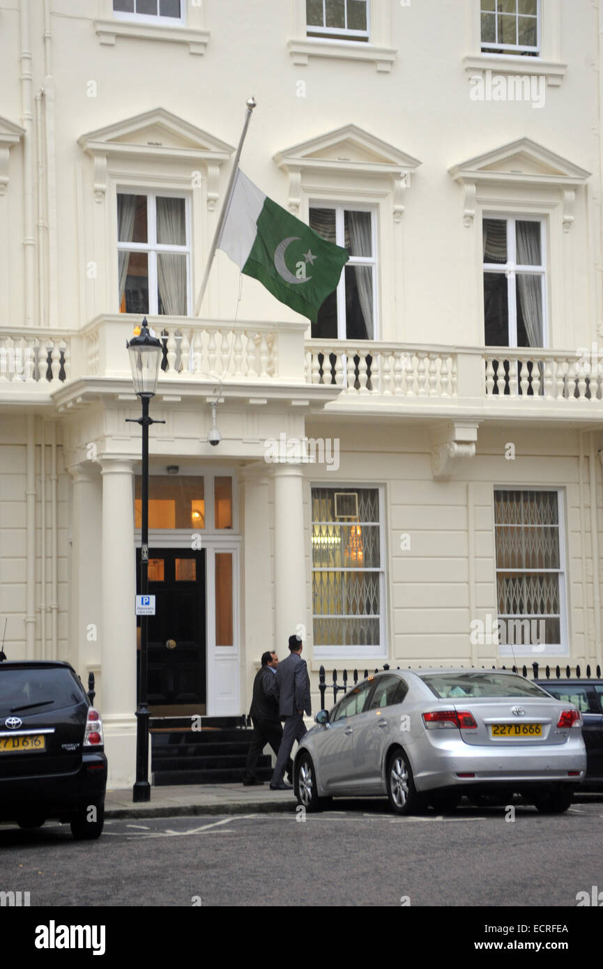 London, UK, 18 December 2014, The Pakistan Embassy in London flies its flag at half-mast in the 3 days of mourning following the Peshawar school massacre. Credit:  JOHNNY ARMSTEAD/Alamy Live News Stock Photo