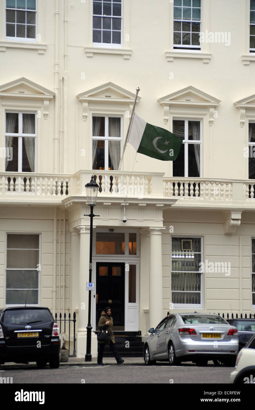 London, UK, 18 December 2014, The Pakistan Embassy in London flies its flag at half-mast in the 3 days of mourning following the Peshawar school massacre. Credit:  JOHNNY ARMSTEAD/Alamy Live News Stock Photo