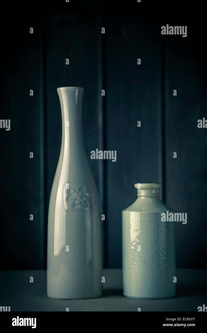 Antique glazed clay bottle and vase. Stock Photo