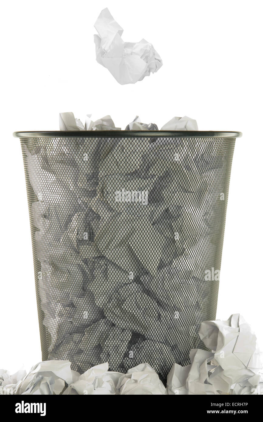 basket full of white wastepaper on white background Stock Photo