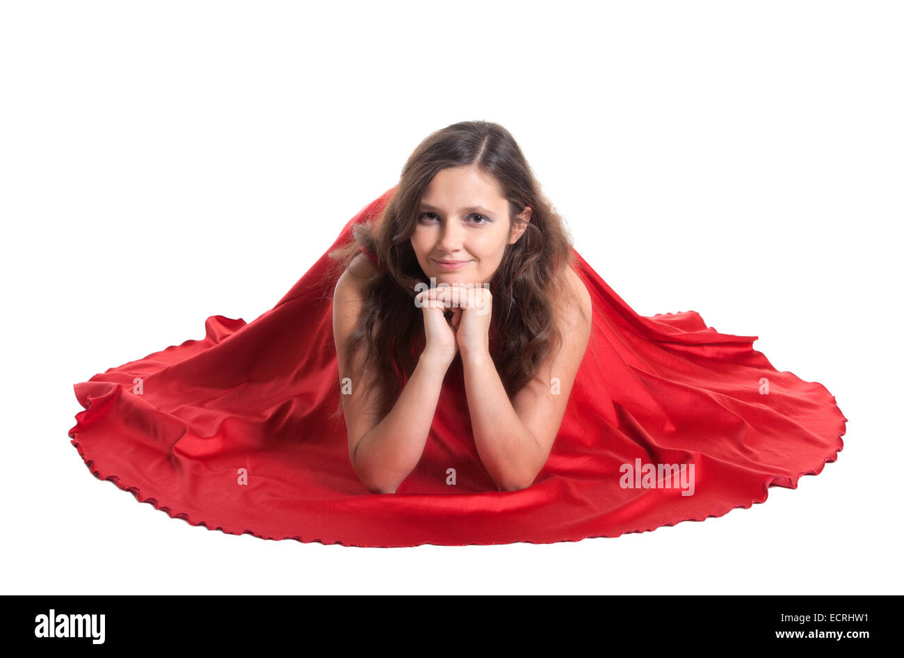 Beautiful woman sitting on the floor, white background Stock Photo - Alamy