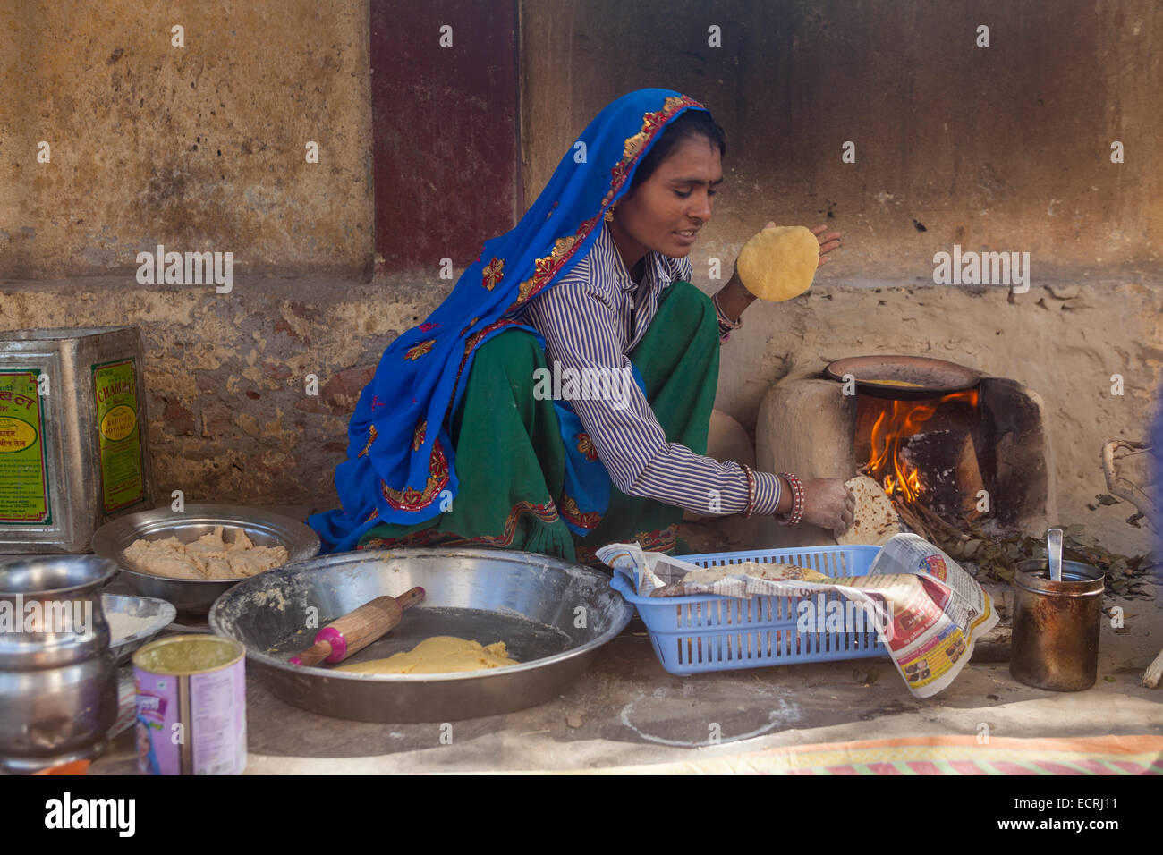 Indian lady cooking hi-res stock photography and images - Alamy