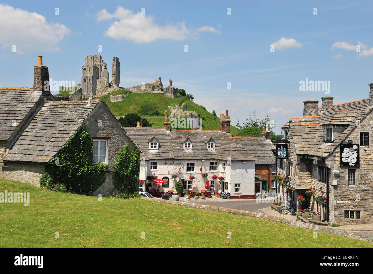 The ruins of Corfe Castle seen from Corfe Castle Village, Dorset, England, United Kingdom. Stock Photo