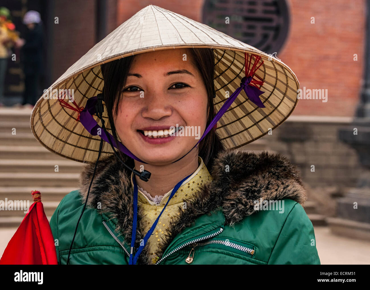 Young Vietnamese Woman with traditional hat. Stock Photo