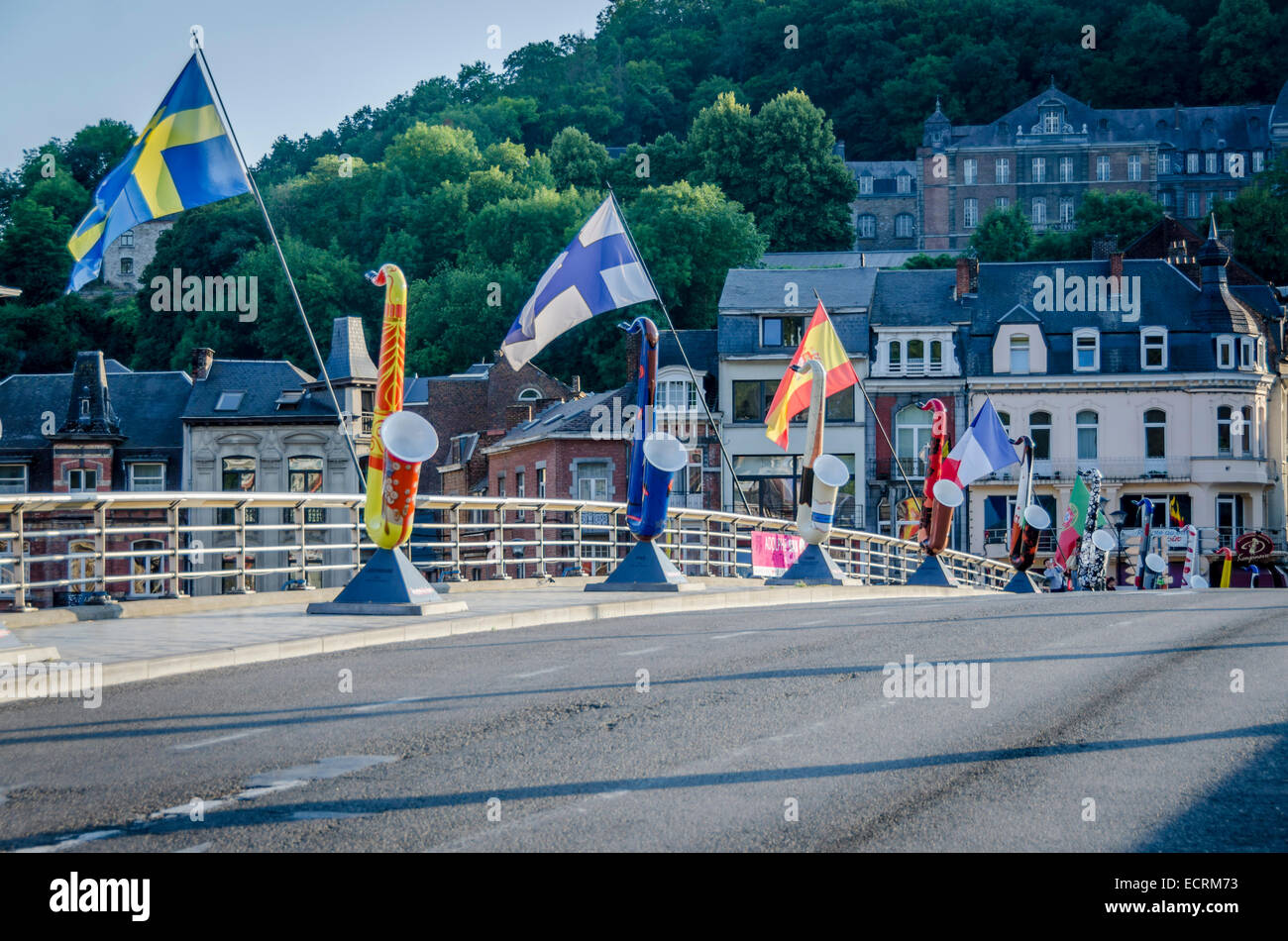 A row of colourful saxaphones on the bridge at Dinant, birthplace of Adolphe Sax, inventor of the saxaphone Stock Photo