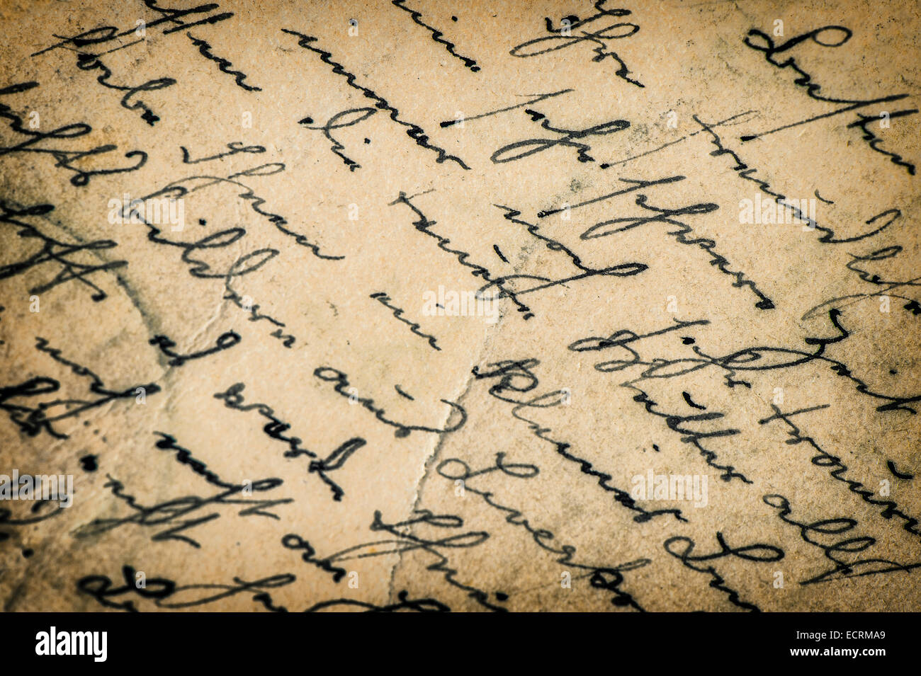 vintage handwriting. manuscript. grunge aged paper background with vignette Stock Photo