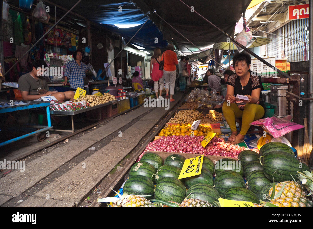 Horizontal view of the marketplace at Maeklong surrounding railway tracks. Stock Photo