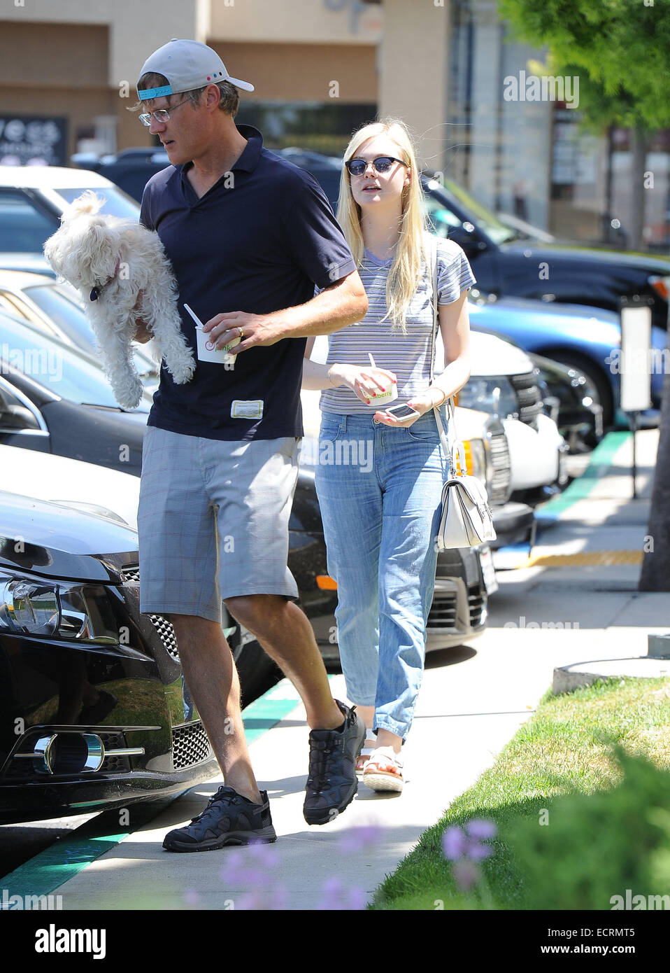 Elle Fanning treats her father Steven Fanning to a Pinkberry yoghurt on