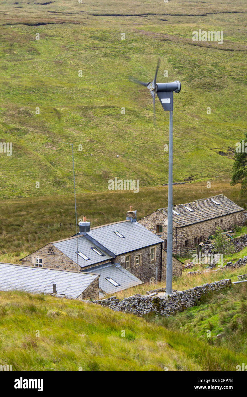 A remote off grid farmhouse at the head of Littondale with a wind turbine for power, Yorkshire Dales, UK. Stock Photo