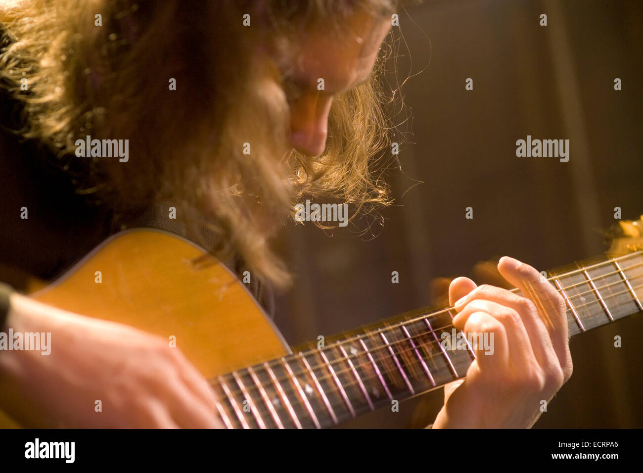 Long Haired Male Musician Playing Guitar Stock Photo 76739774 Alamy