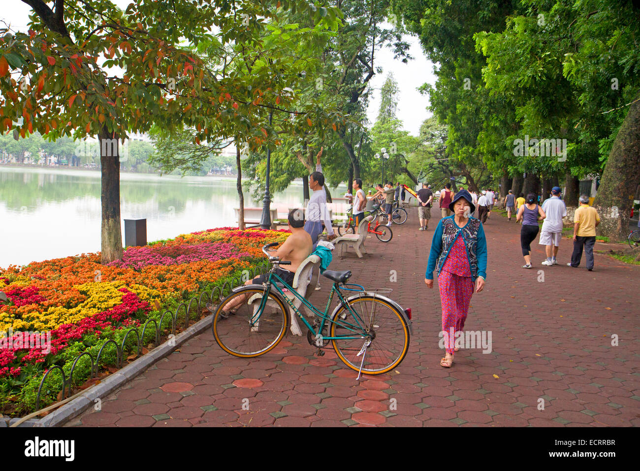 Morning exercises around Hanoi's Hoan Kiem Lake Stock Photo