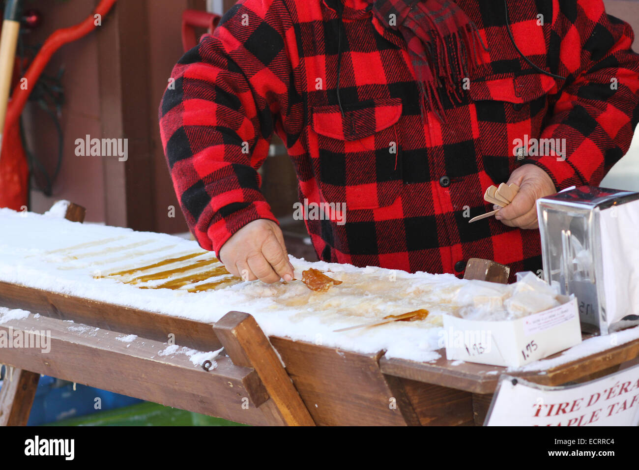 The process of making maple taffy using canadian Maple Syrup and snow Stock Photo Alamy