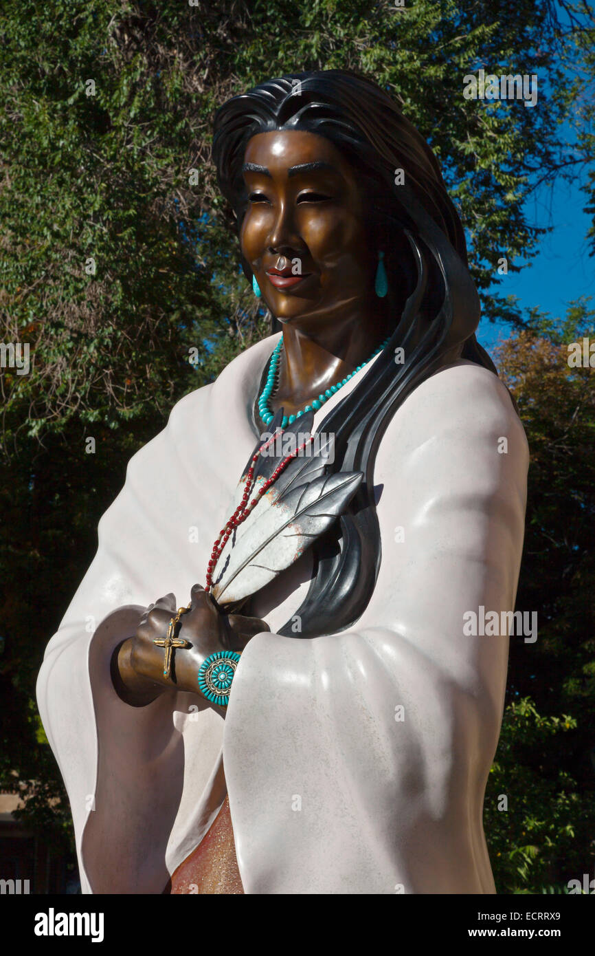Native American statue in front of the CATHEDRAL BASILICA OF SAINT FRANCIS of ASSISI - SANTA FE,  NEW MEXICO Stock Photo