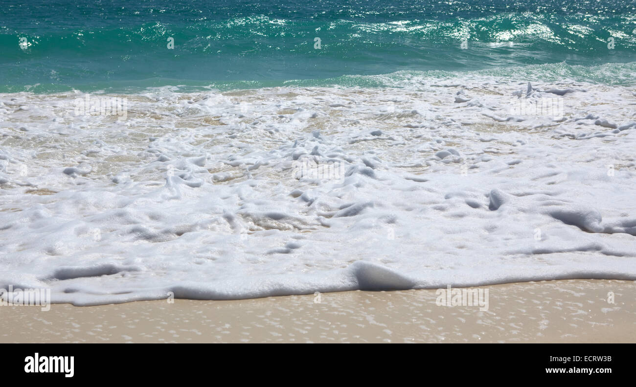 Snow-white foam of the Caribbean Sea. Playa los Cocos. Cayo Largo. Cuba. Stock Photo