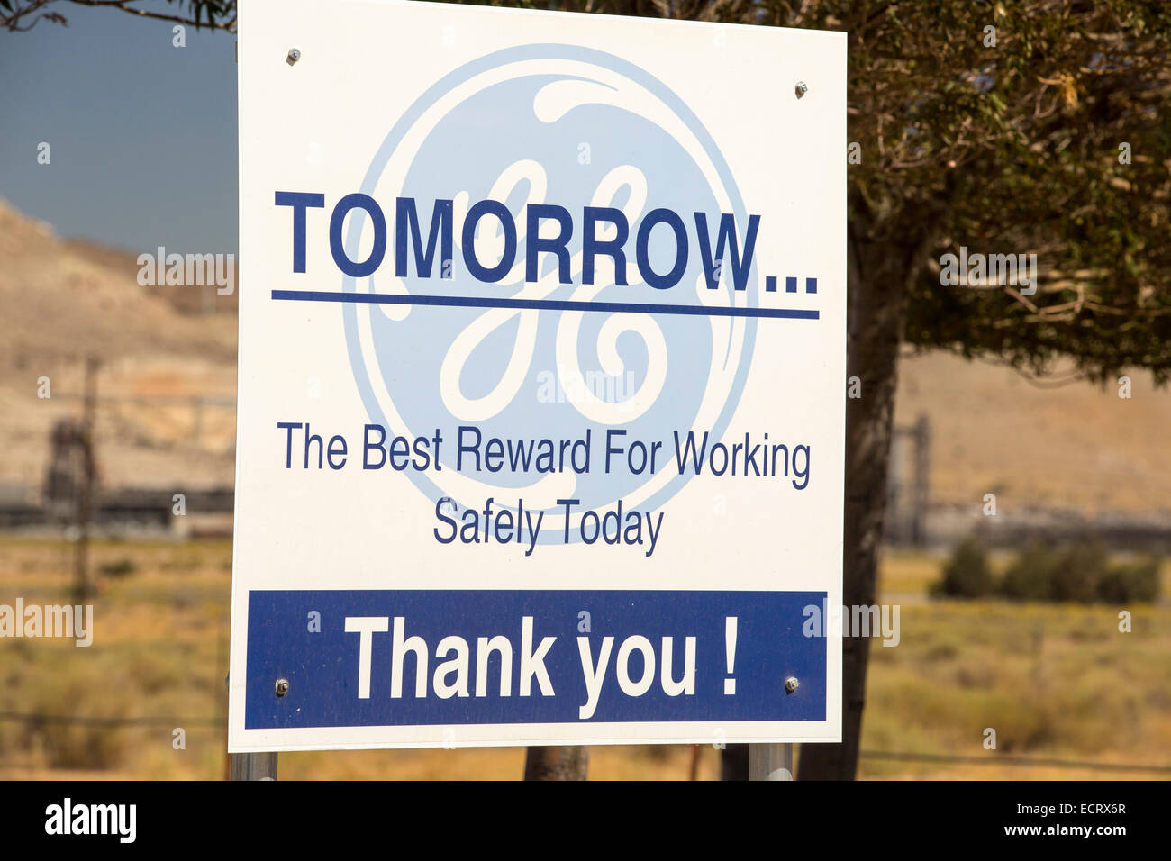 A sign at a wind farm plant at the Tehachapi Pass wind farm, the first large scale wind farm area developed in the US, California, USA. Stock Photo
