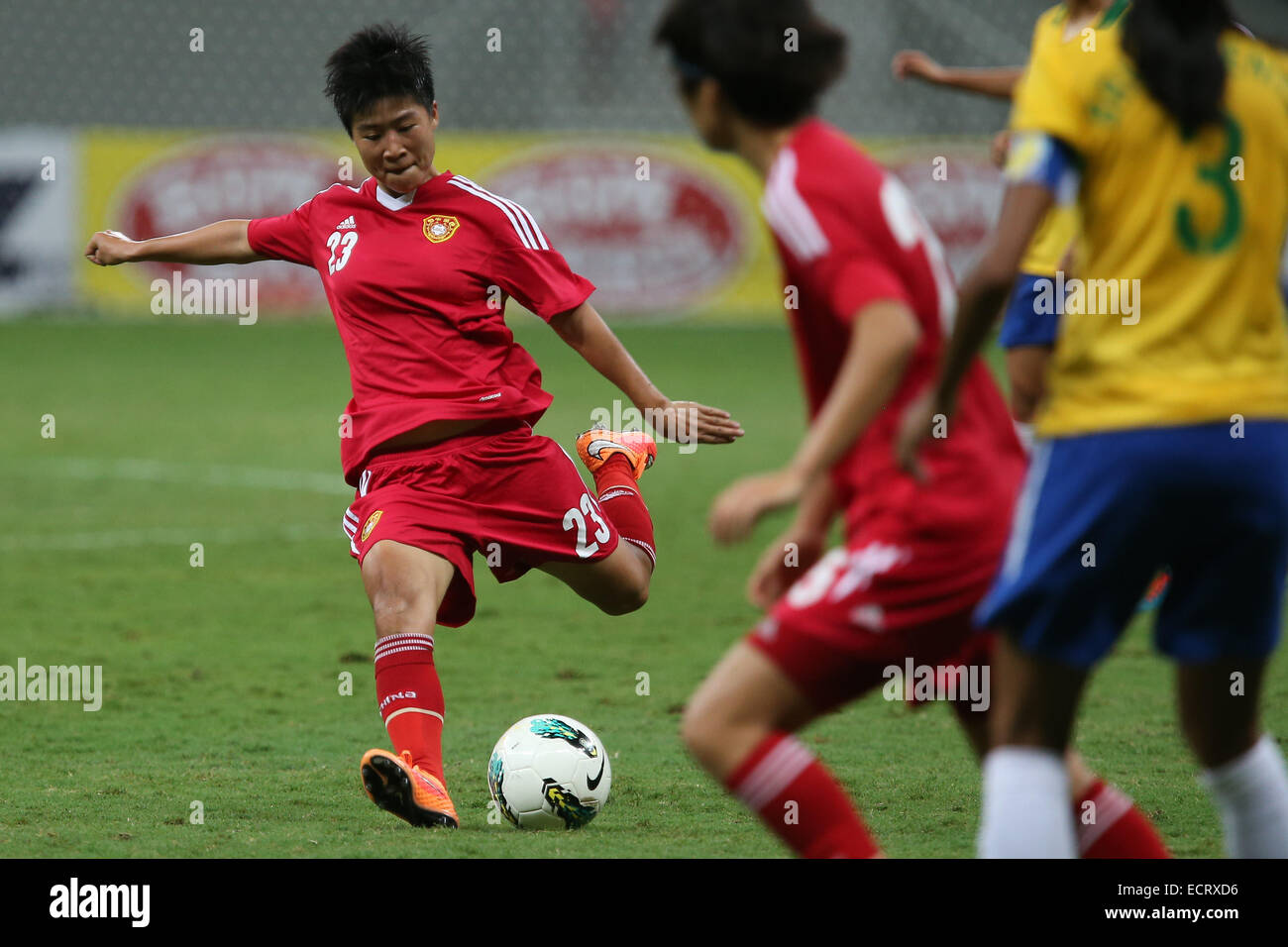 Brasilia, Brazil. 18th Dec, 2014. China's Ren Guixin (1st L) shoots during a match between China and Brazil of the 2014 International Tournament of Brasilia in Brasilia, capital of Brazil, Dec. 18, 2014. Brazil won 4-1. © Xu Zijian/Xinhua/Alamy Live News Stock Photo