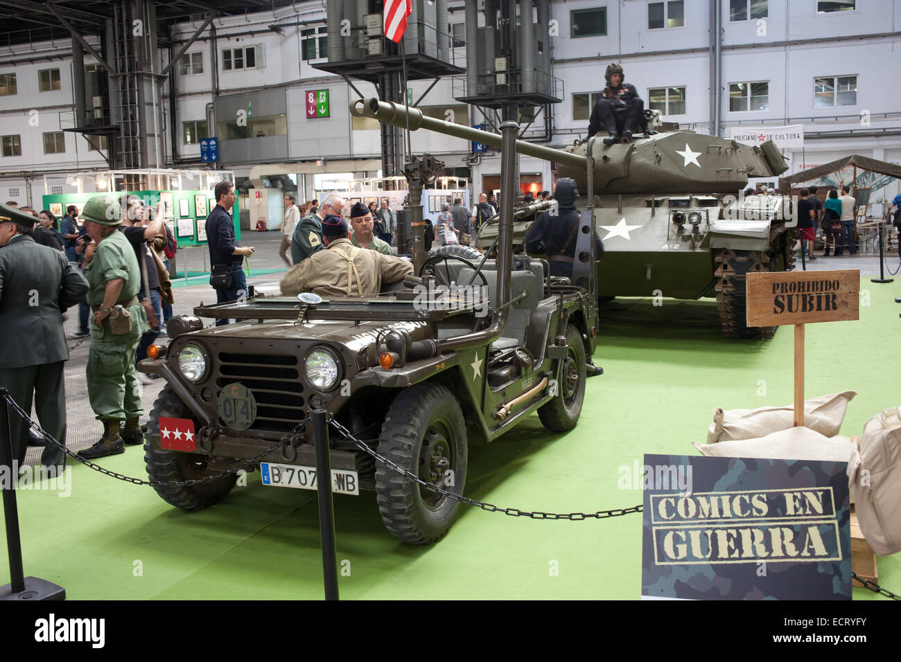 Tank and car at 32nd Barcelona International Comic Fair - exhibition on the War in Catalonia, Spain. Stock Photo