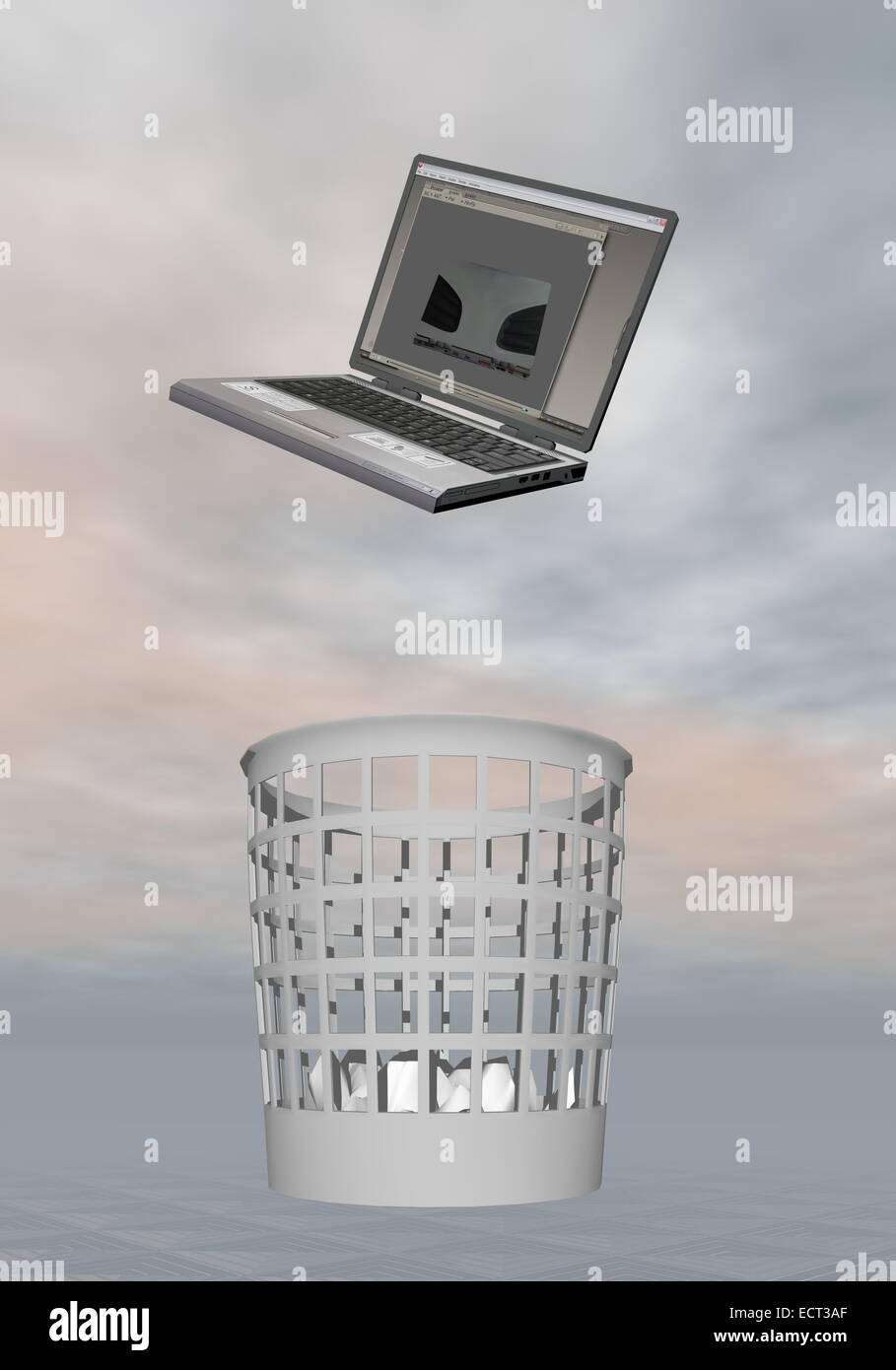 Throwing laptop to the rubbish in grey background Stock Photo Alamy