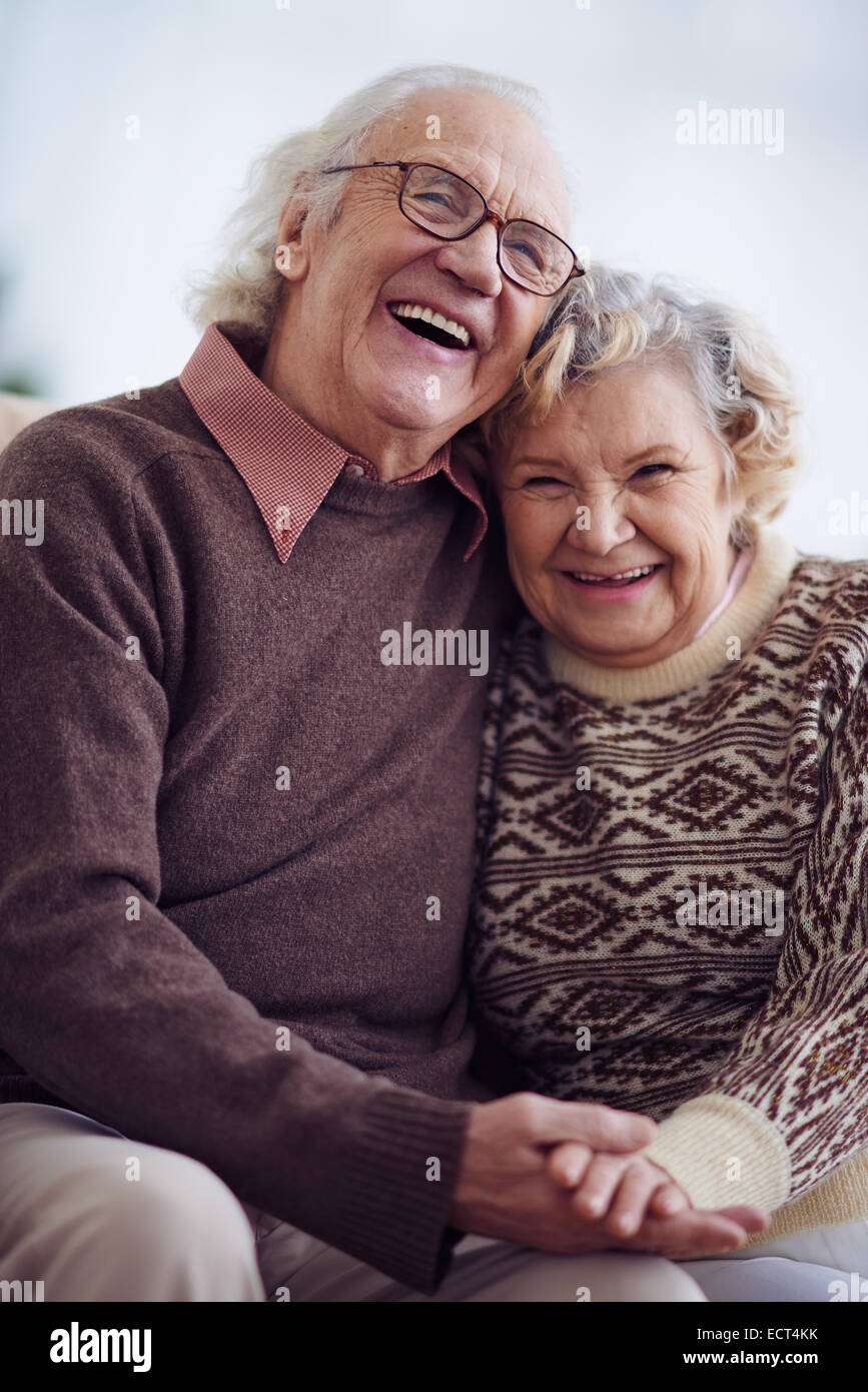 Laughing husband and wife of retirement age Stock Photo