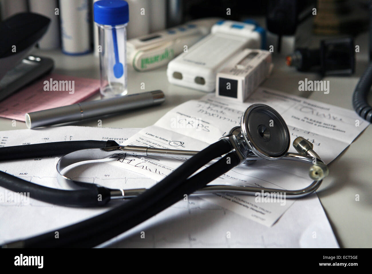 A doctor's desk at a general practitioner's surgery. UK. Stock Photo