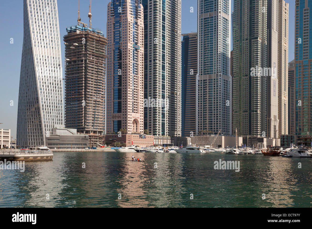 rowing boat and skyscraper of Dubai Marina, Dubai, United Arab Emirates, Asia Stock Photo