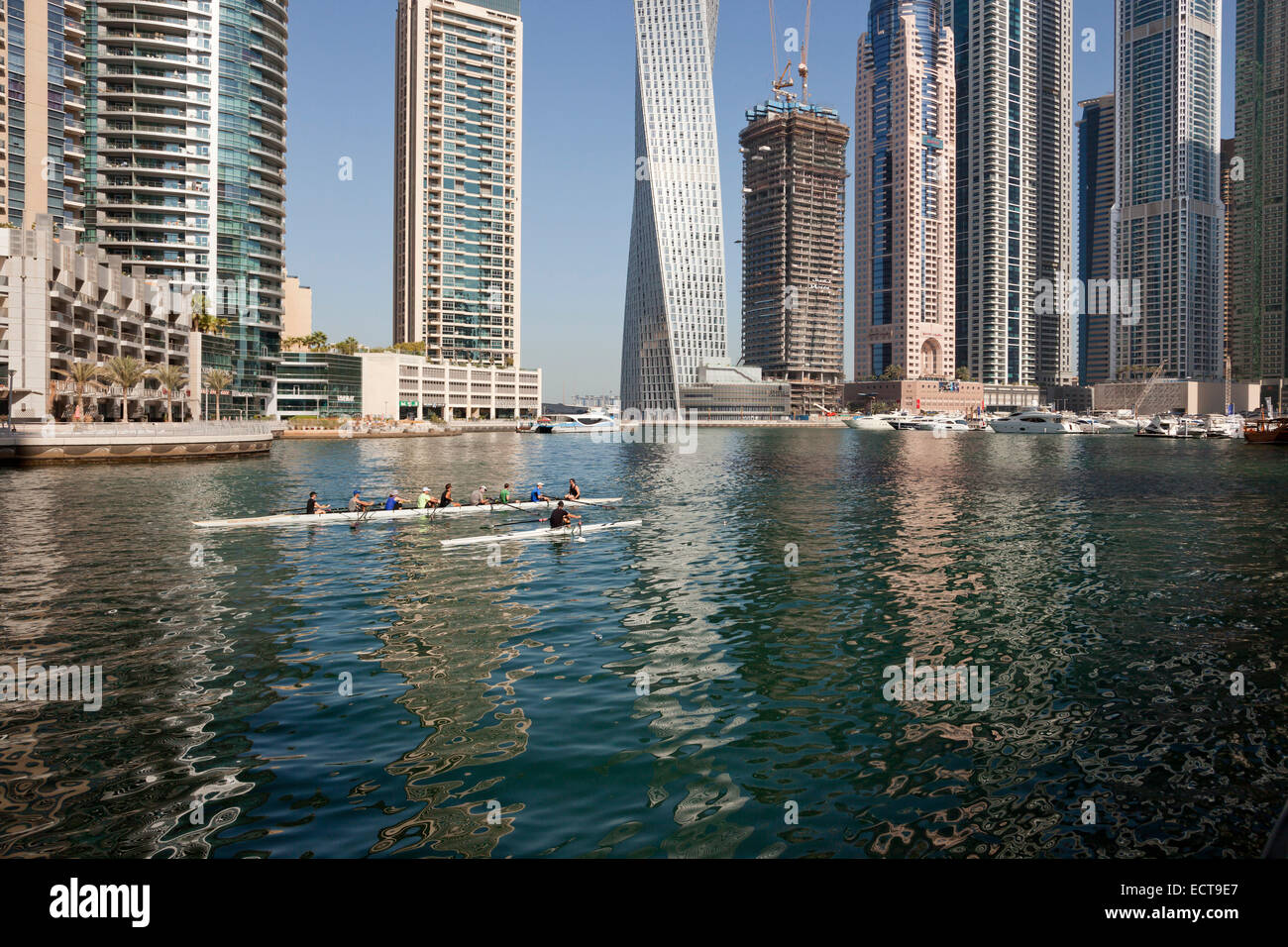 rowing boat and skyscraper of Dubai Marina, Dubai, United Arab Emirates, Asia Stock Photo
