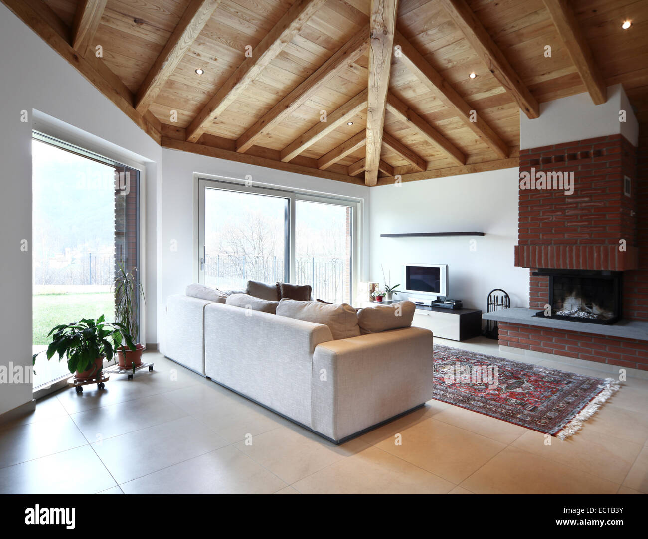 modern cozy apartment interior open space wooden roof Stock Photo - Alamy
