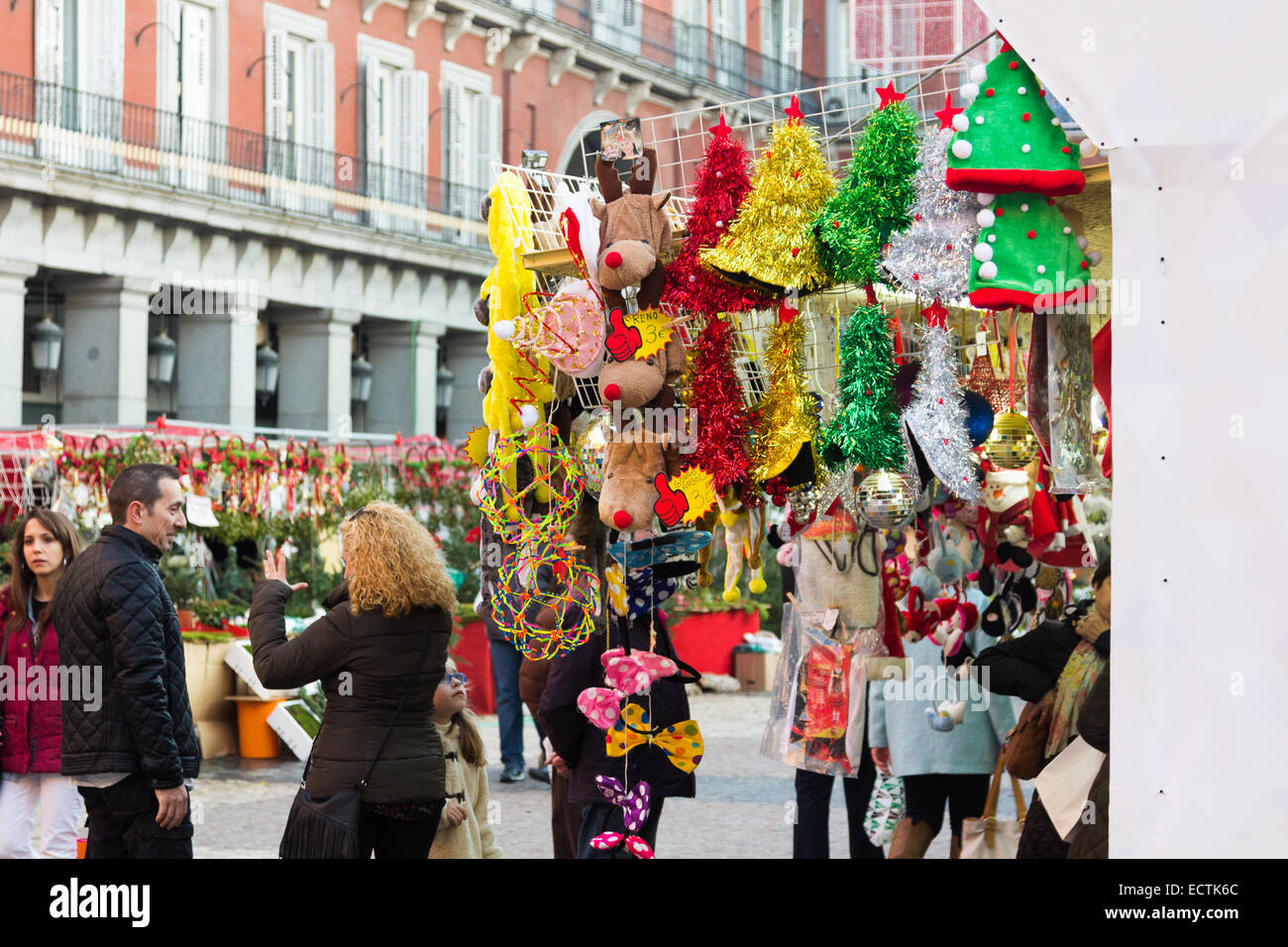 MADRID,SPAIN - DECEMBER 18: Famous Christmas market full of shops with all kinds of articles for parties and some street perform Stock Photo