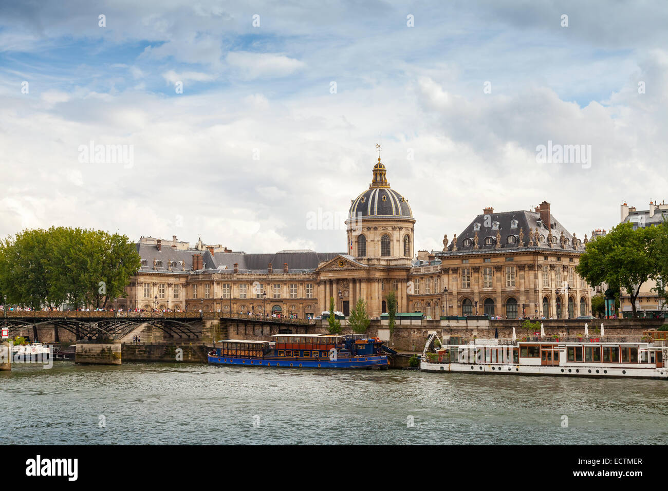 Paris, France - August 07, 2014: Seine river coast with Facade of Institute de France in Paris. Architect Louis Le Vau, was made Stock Photo