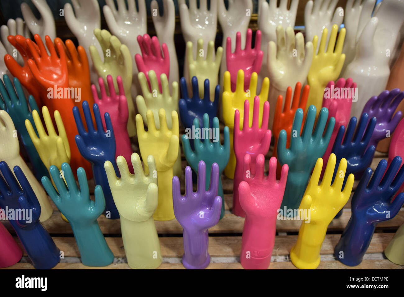 A display of hand shaped ceramic jewelry holders at the Fish's Eddy at