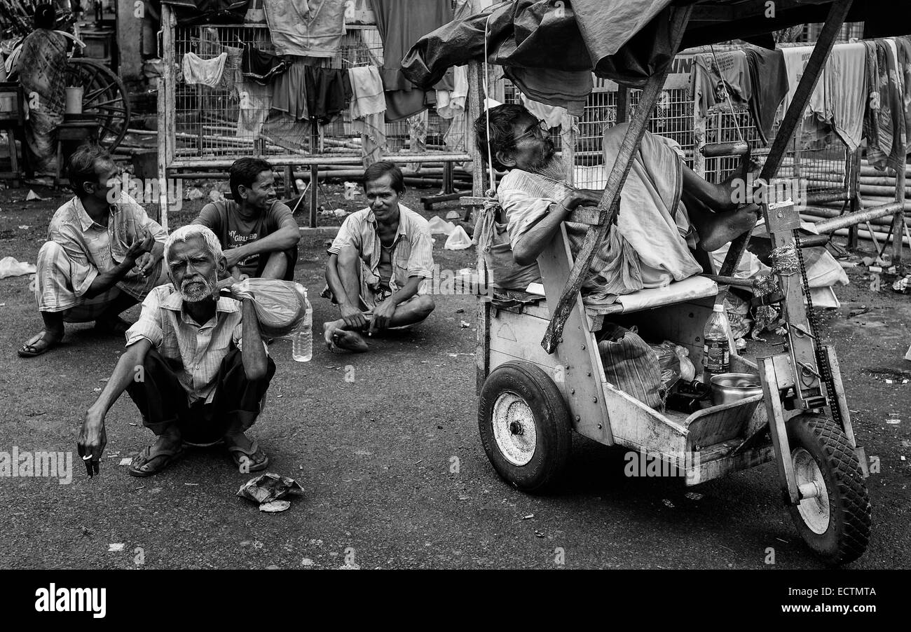 Beggars seek alms near the Hindu temple on August 17, 2011 in Kalighat