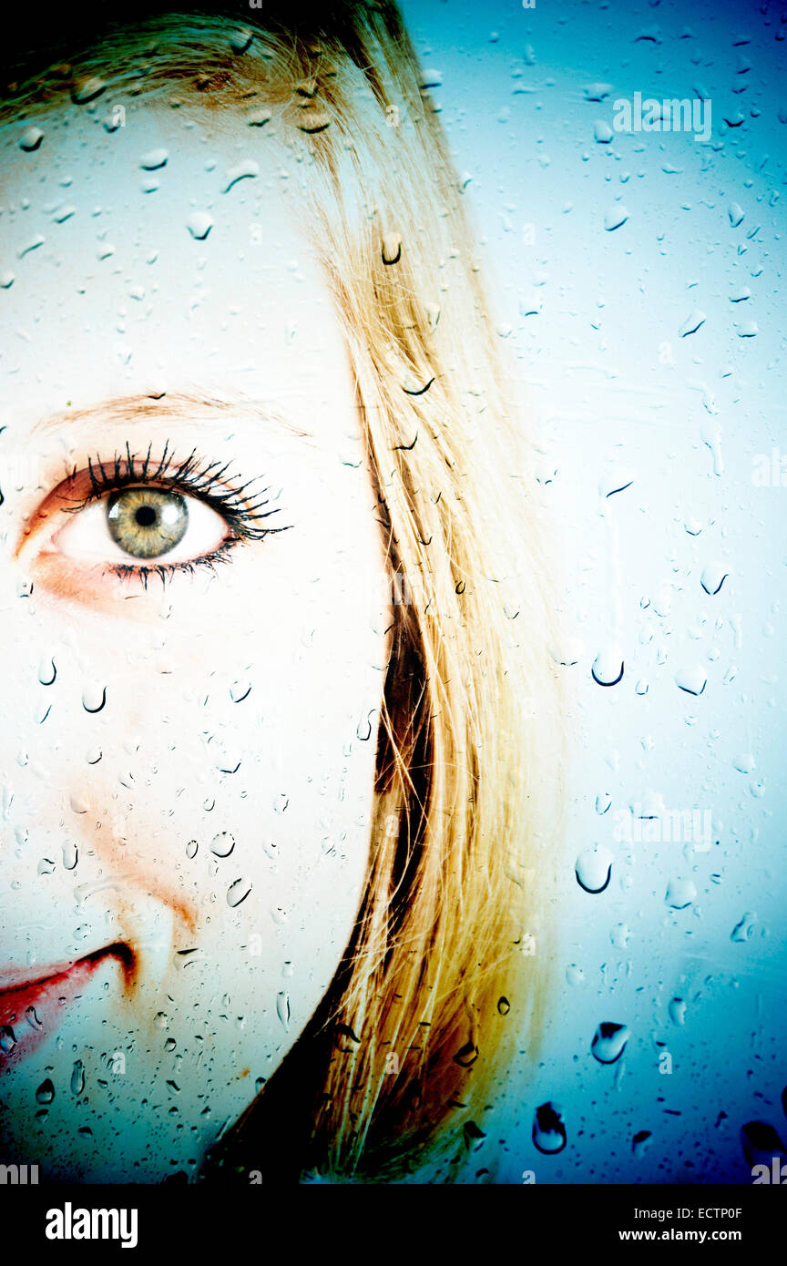 Woman face behind glass hi-res stock photography and images - Alamy