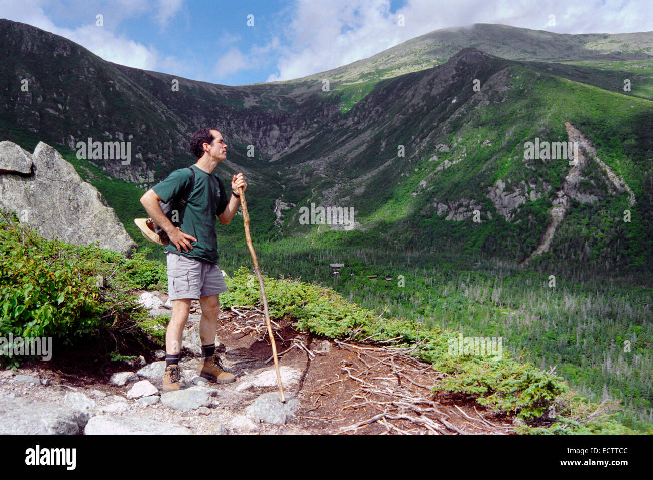 Lone hiker taking a break on the Presidential Range, New Hampshire, USA. Stock Photo