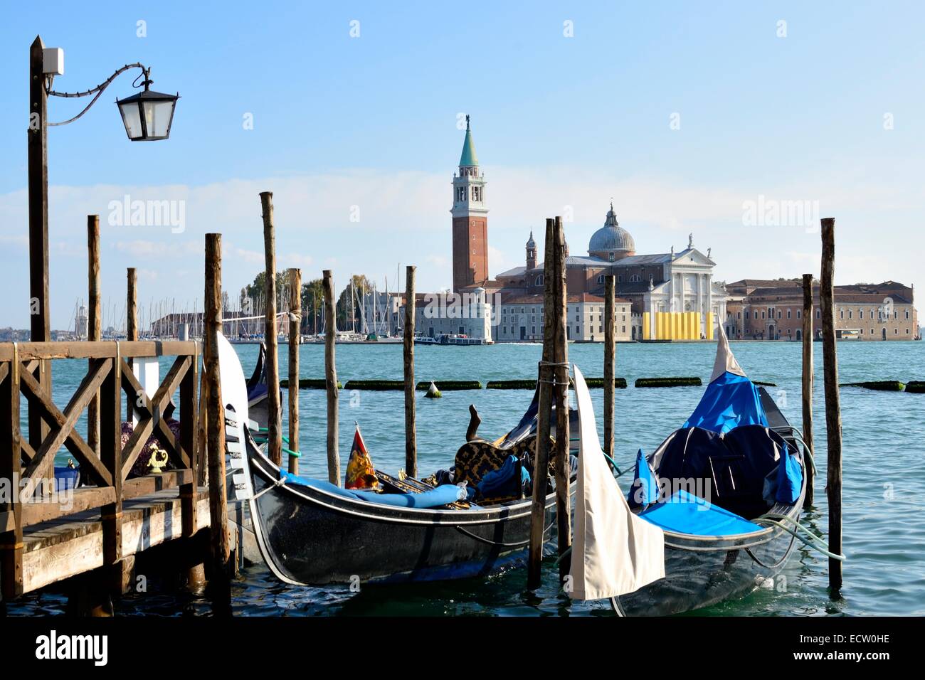 Gondolas in Venice with Lido in background Stock Photo