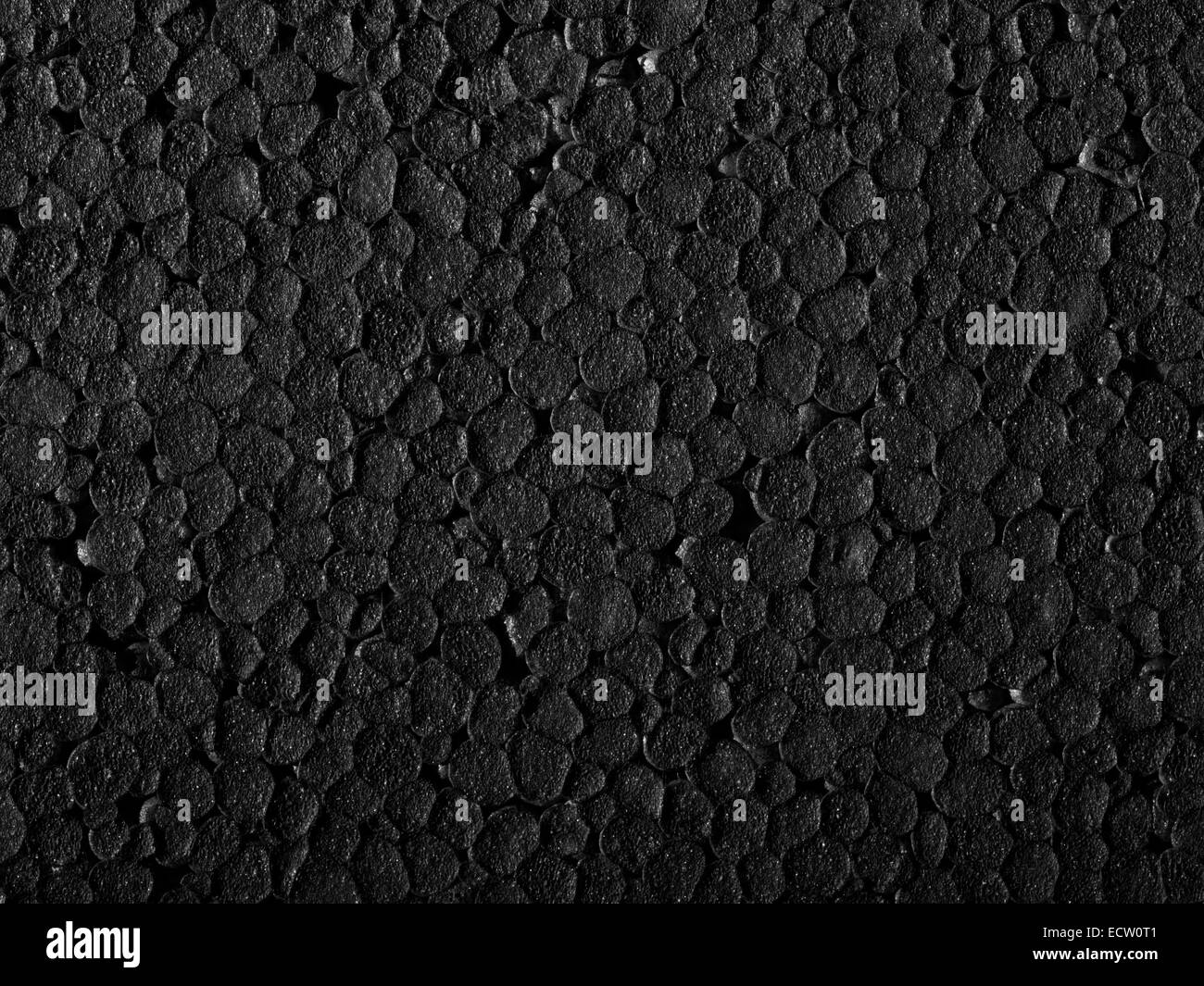 Full frame closeup of a black Polystyrene surface Stock Photo