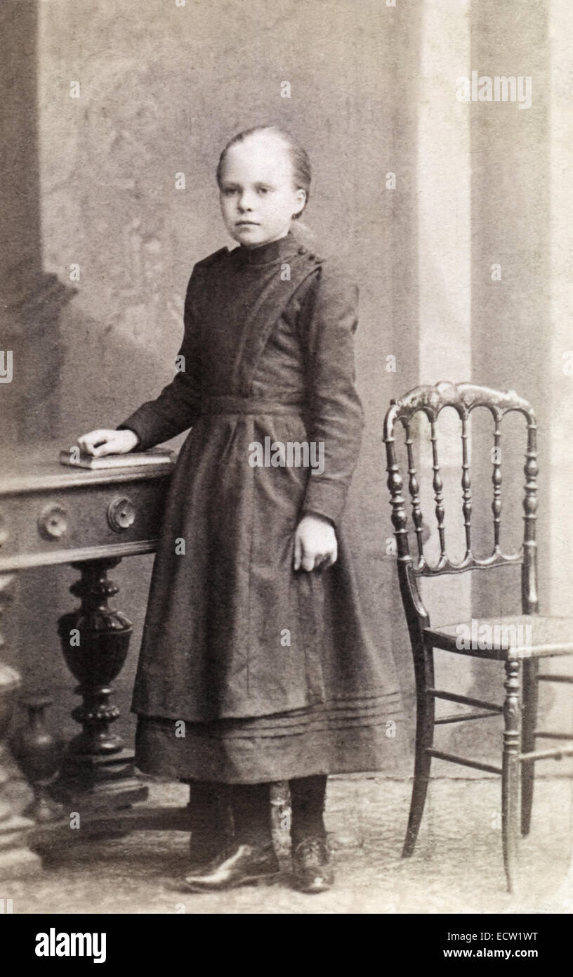 Retro portrait of a girl of primary school age, circa 1900, Saint-Petersburg, Russia Stock Photo