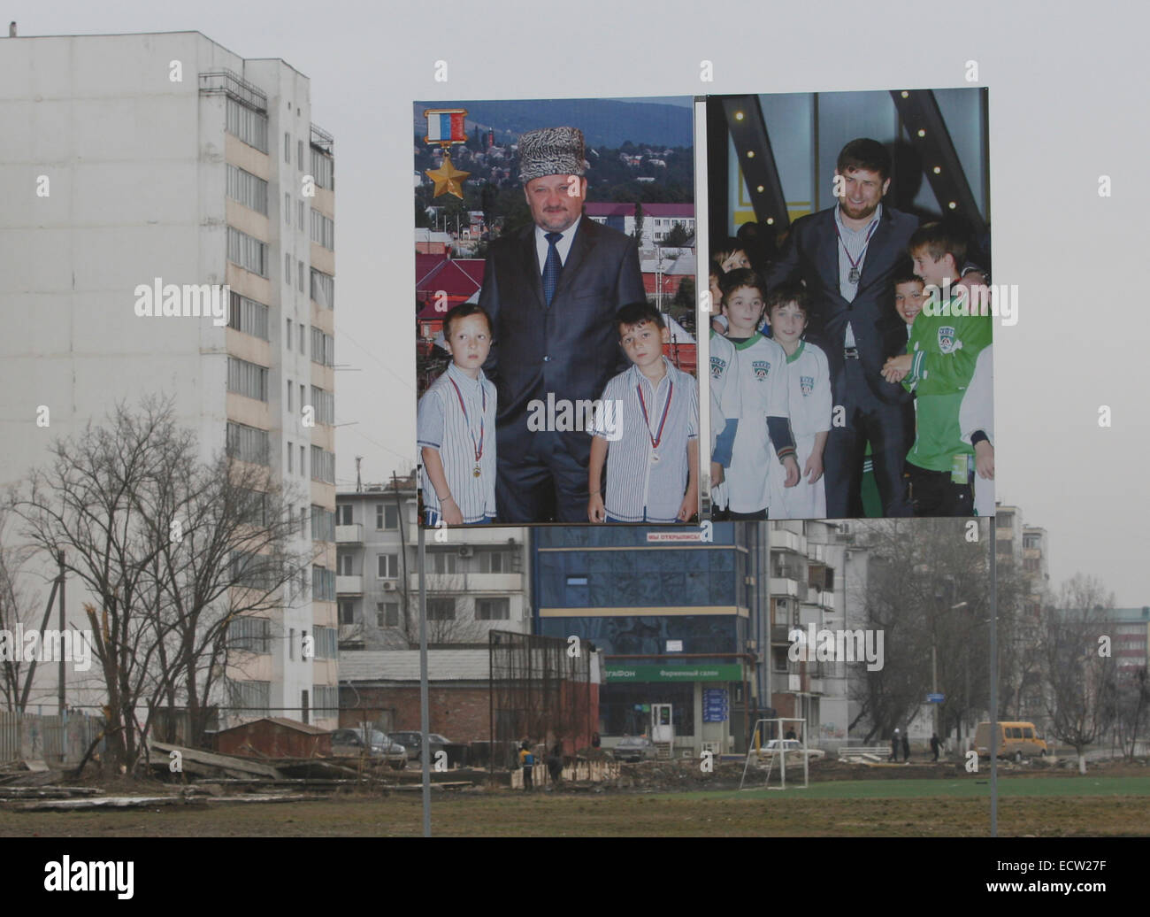 Billboard showing the former Chechen president Achmat Kadyrov and his son, the current president Ramzan Kadyrov, at the Ramzan Football Academy in the Chechen capital Grozny, Russia Stock Photo
