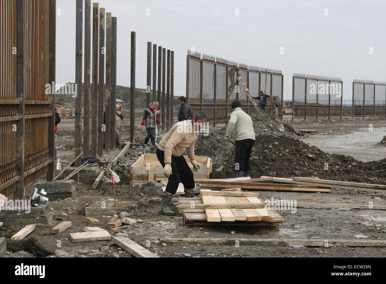 Workers at the construction site of the 'Akhmat Arena' sports stadium in the Chechen capital Grozny, Russia. The building was first used in May 2011. Stock Photo