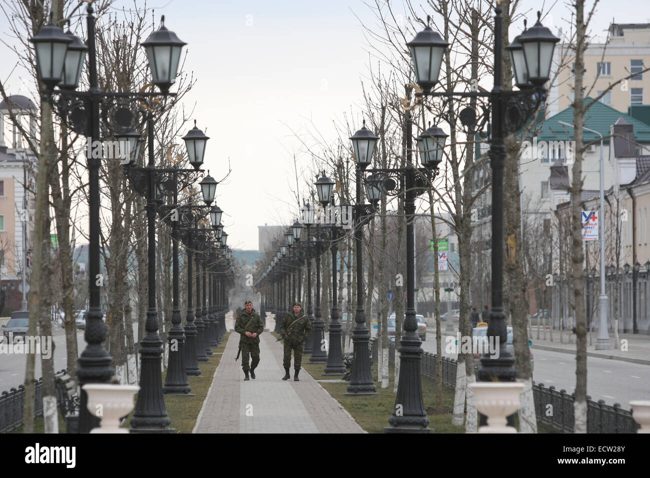 Soldiers patrolling Putin Avenue, the former Victory Avenue, in the centre of the Chechen capital Grozny, Russia. It is the main street of Grozny and has undergone a true metamorphose in recent years, following almost total destruction during two wars. Stock Photo