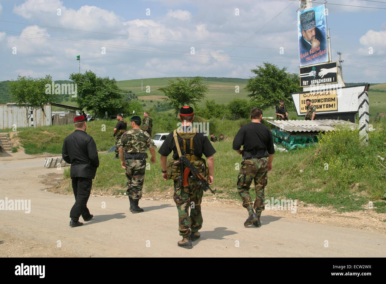 Chechen leader Ramzan Kadyrov, the later president, and several of his men at the entrance to the village of Tsentoroi, Chechnya, Russia. Stock Photo
