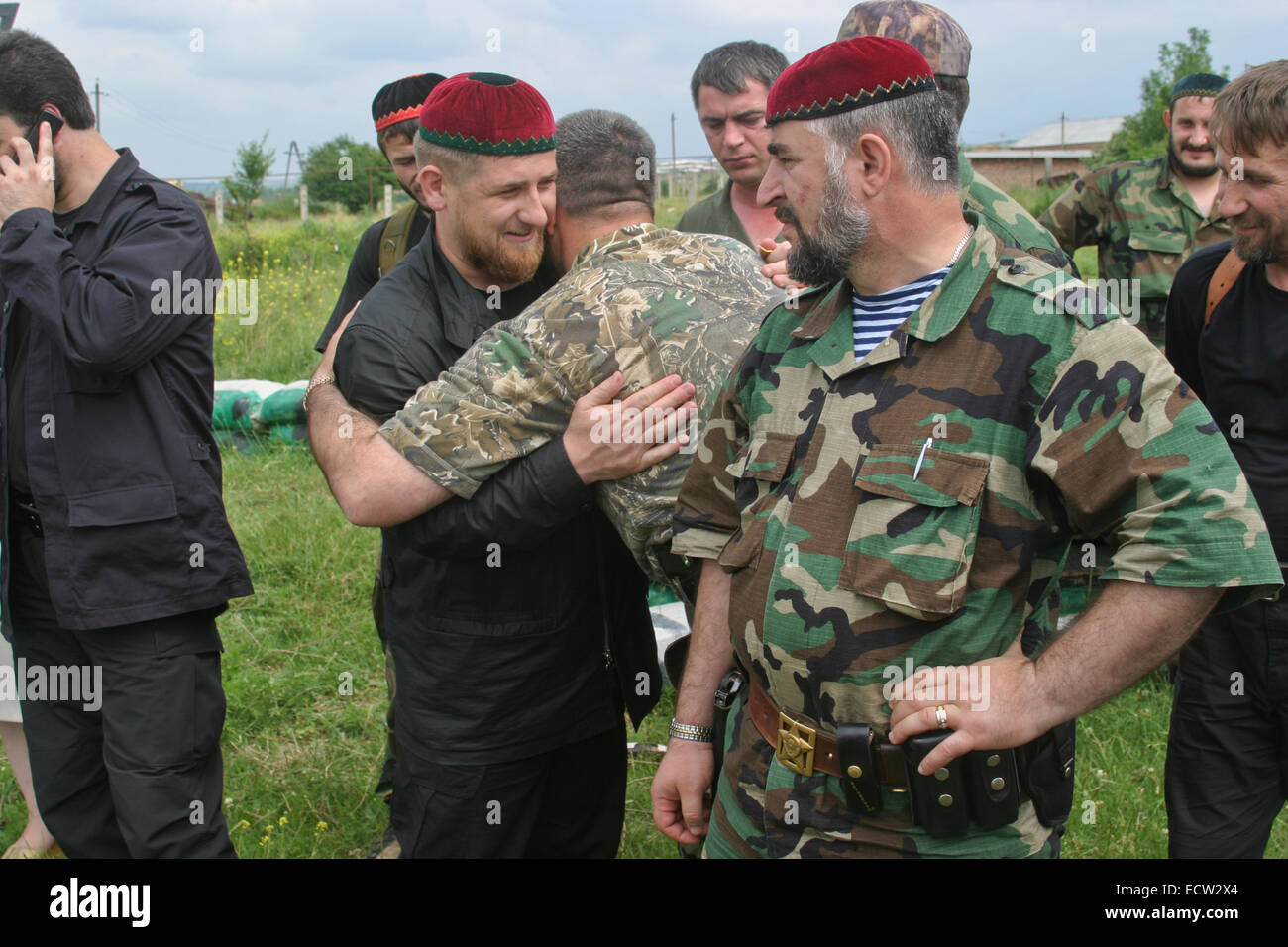 Chechen leader Ramzan Kadyrov, the later president, and several of his men at the entrance to the village of Tsentoroi, Chechnya, Russia. Stock Photo