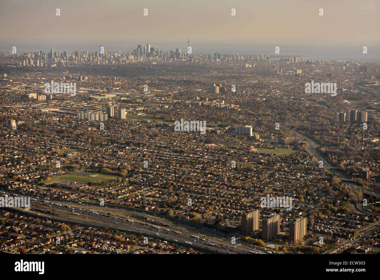 Aerial view of Highway 401 and 400 Black Creek Drive with downtown Toronto city skyline on Lake Ontario Canada Stock Photo