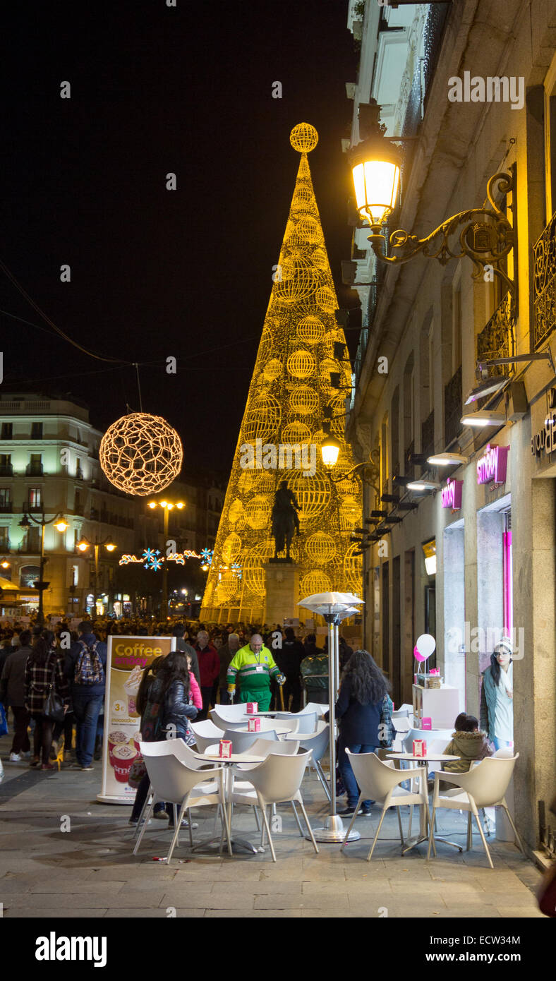 MADRID,SPAIN - DECEMBER 18: The streets of Madrid are filled with lights and people doing their Christmas shopping December 18, Stock Photo