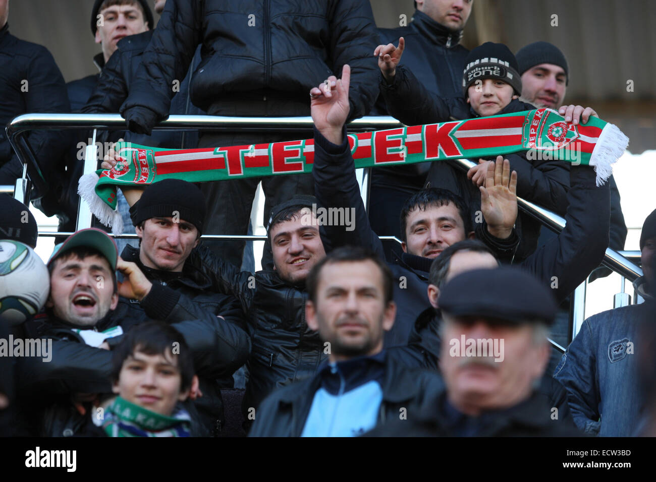Supporters of FC Terek, at the Terek football stadium in the Chechen capital Grozny, Russia Stock Photo
