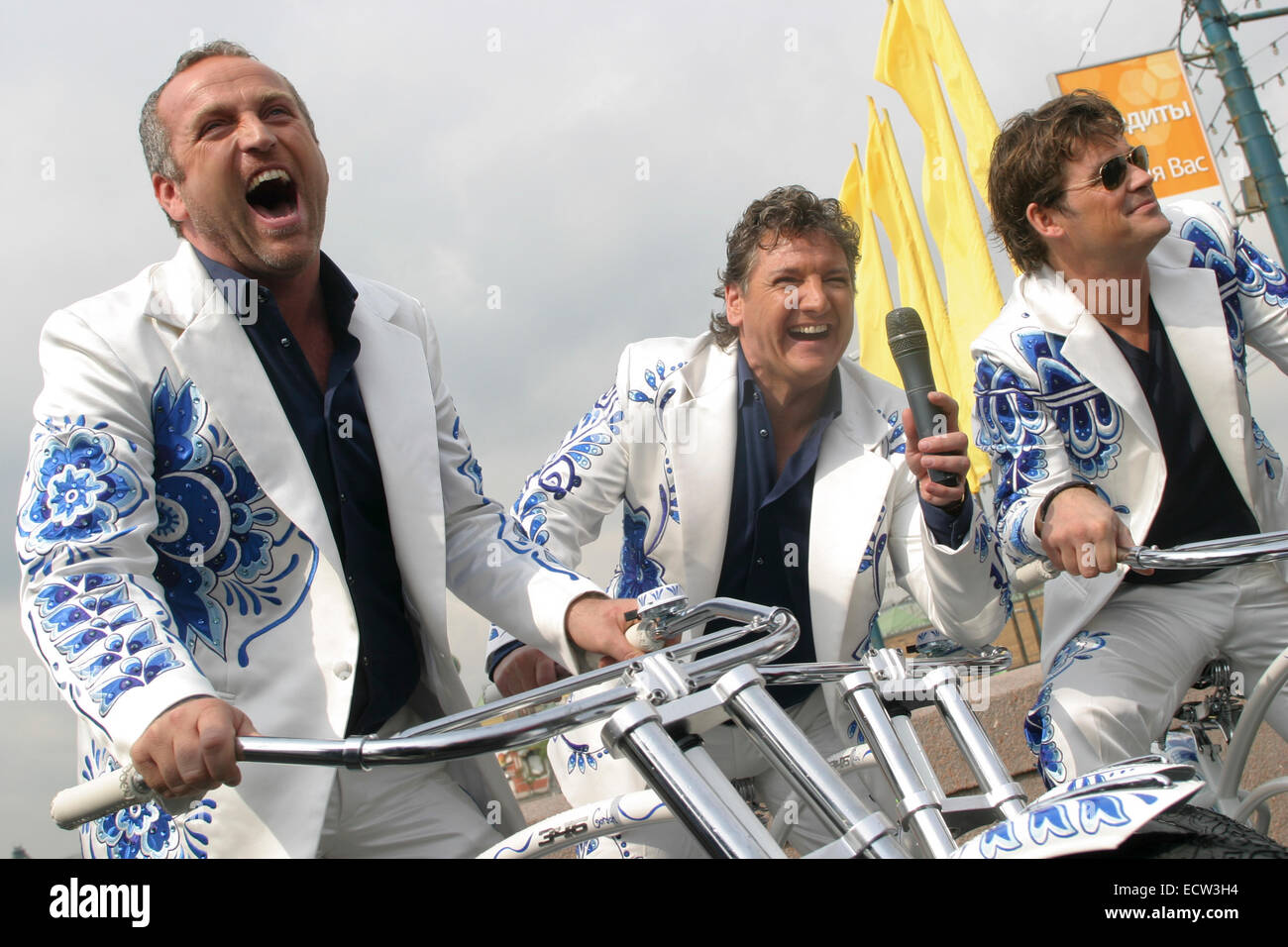 Dutch music group The Toppers with their bicycles near the Kremlin in  Moscow. Formed in 2005, the group represented The Netherlands in the  Eurovision Song Contest, held in Moscow in 2009 Stock