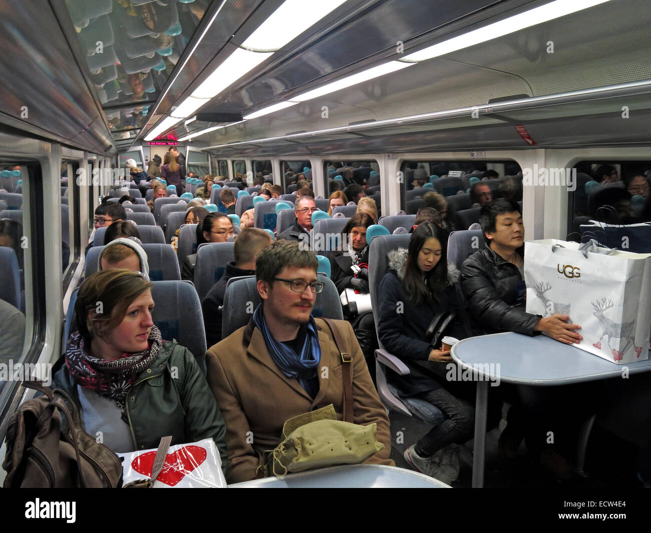 Crowded Arriva Wales Train Chester Holyhead with Xmas Shoppers Stock Photo