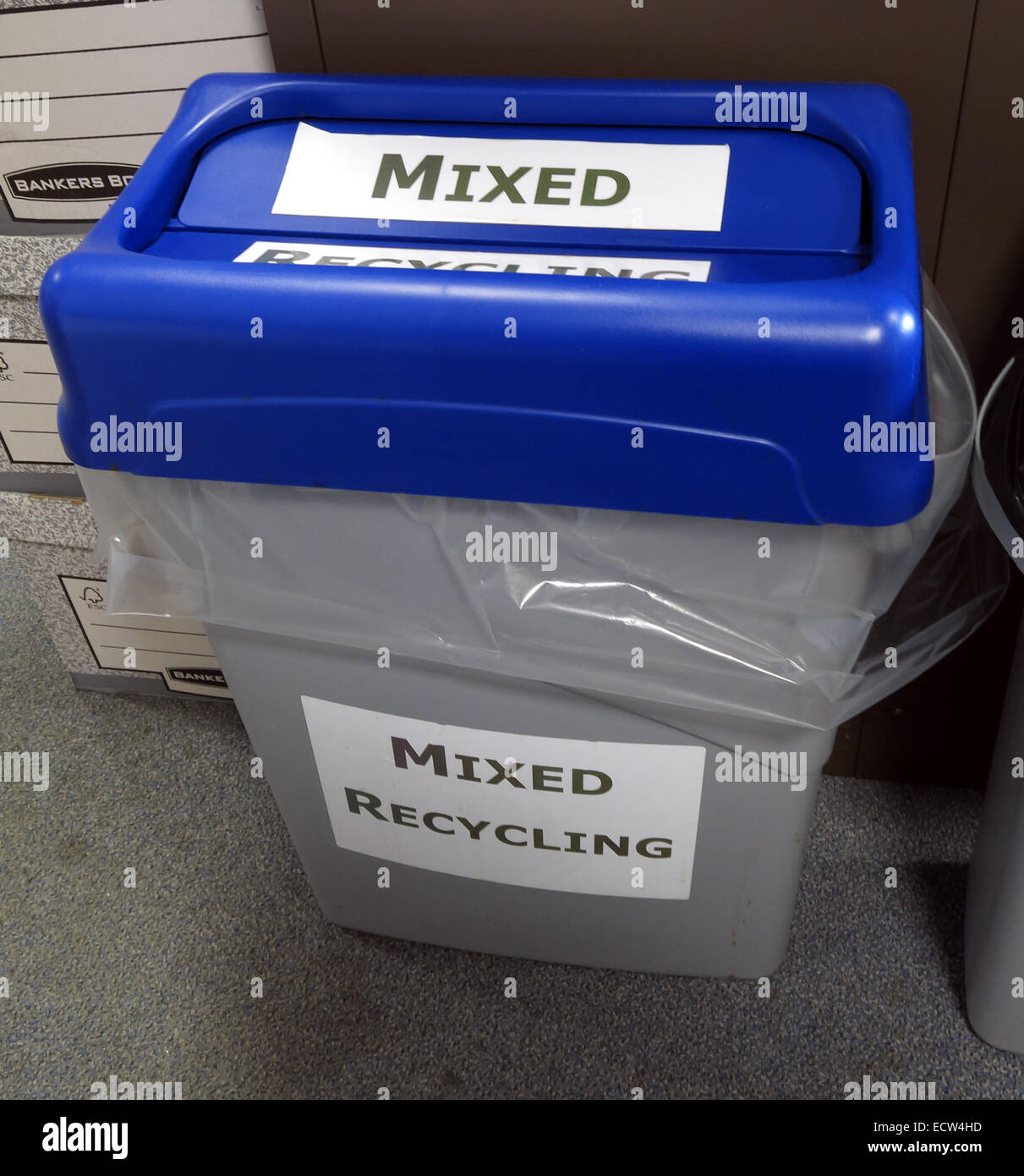 Mixed Recycling Bin in Blue & Grey for waste. Who knows what to put in these? Stock Photo